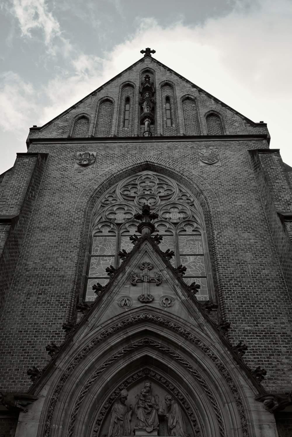 a black and white photo of an old church