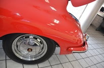 Close-up of a shiny antique car in the showroom.