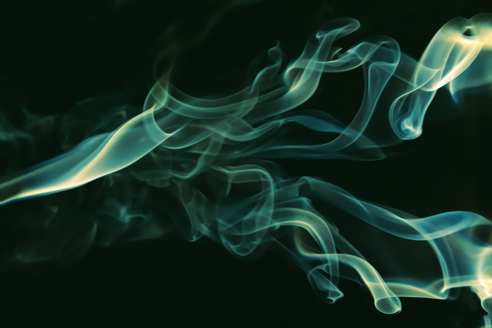 a close up of smoke on a black background