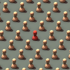 Un pion rouge au milieu de pions blancs