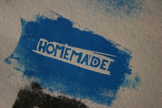 the word homemade painted on a piece of paper