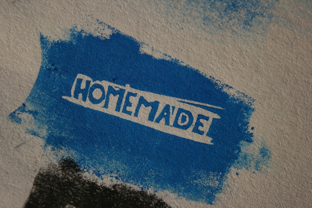 the word homemade painted on a piece of paper