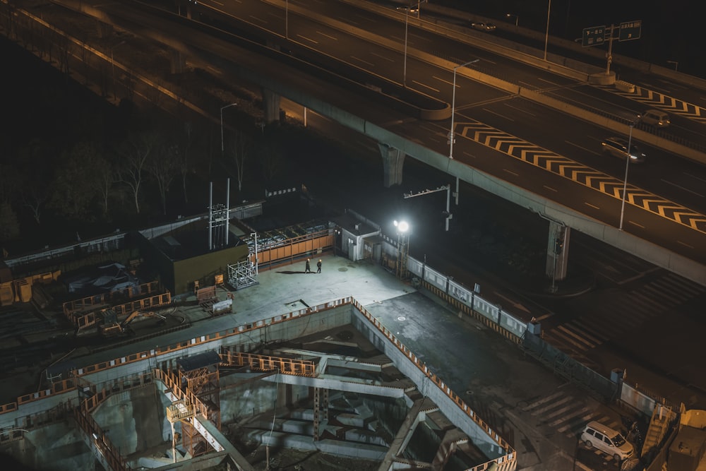 an overhead view of a construction site at night