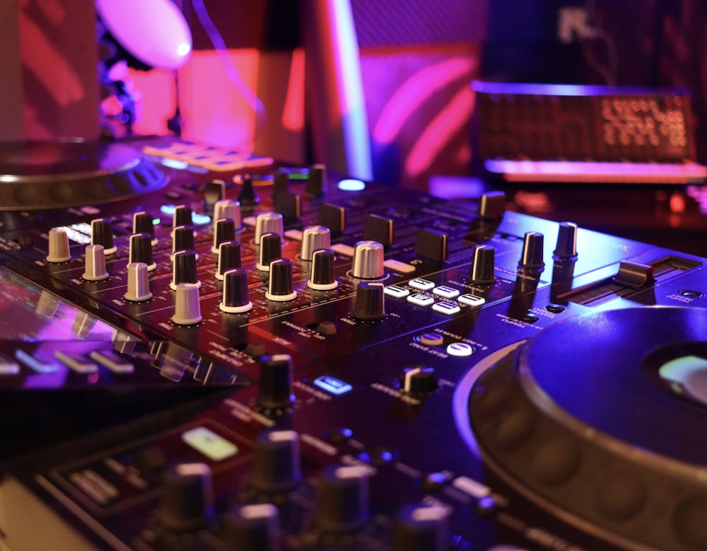 a dj mixing a track in a nightclub
