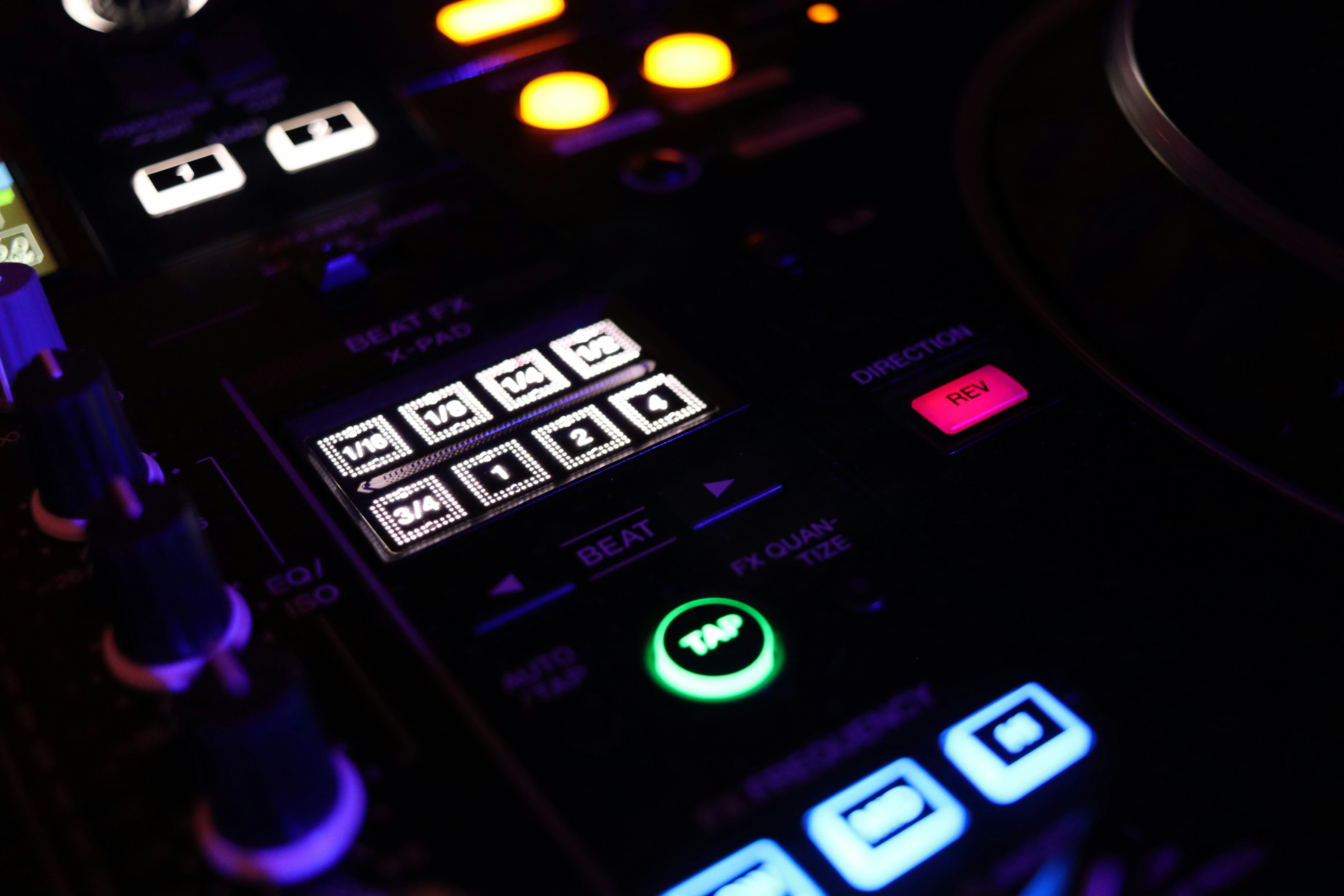 a close up of a control panel in a recording studio