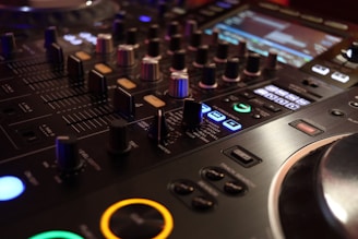 a close up of a dj's control panel