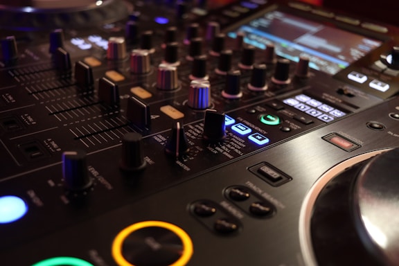 a close up of a dj's control panel
