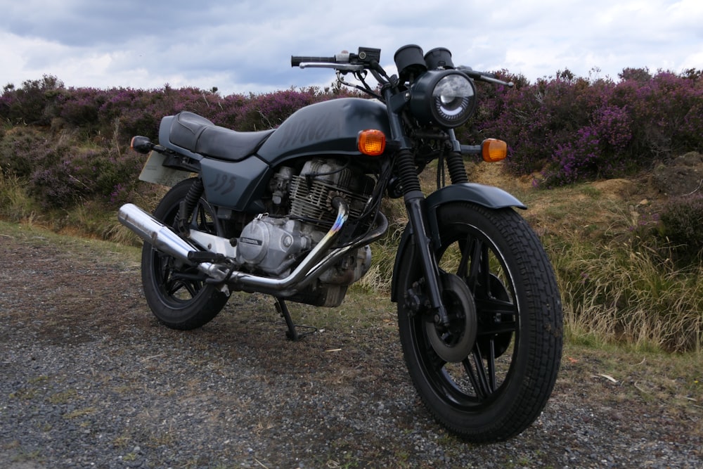 a motorcycle parked on the side of a road