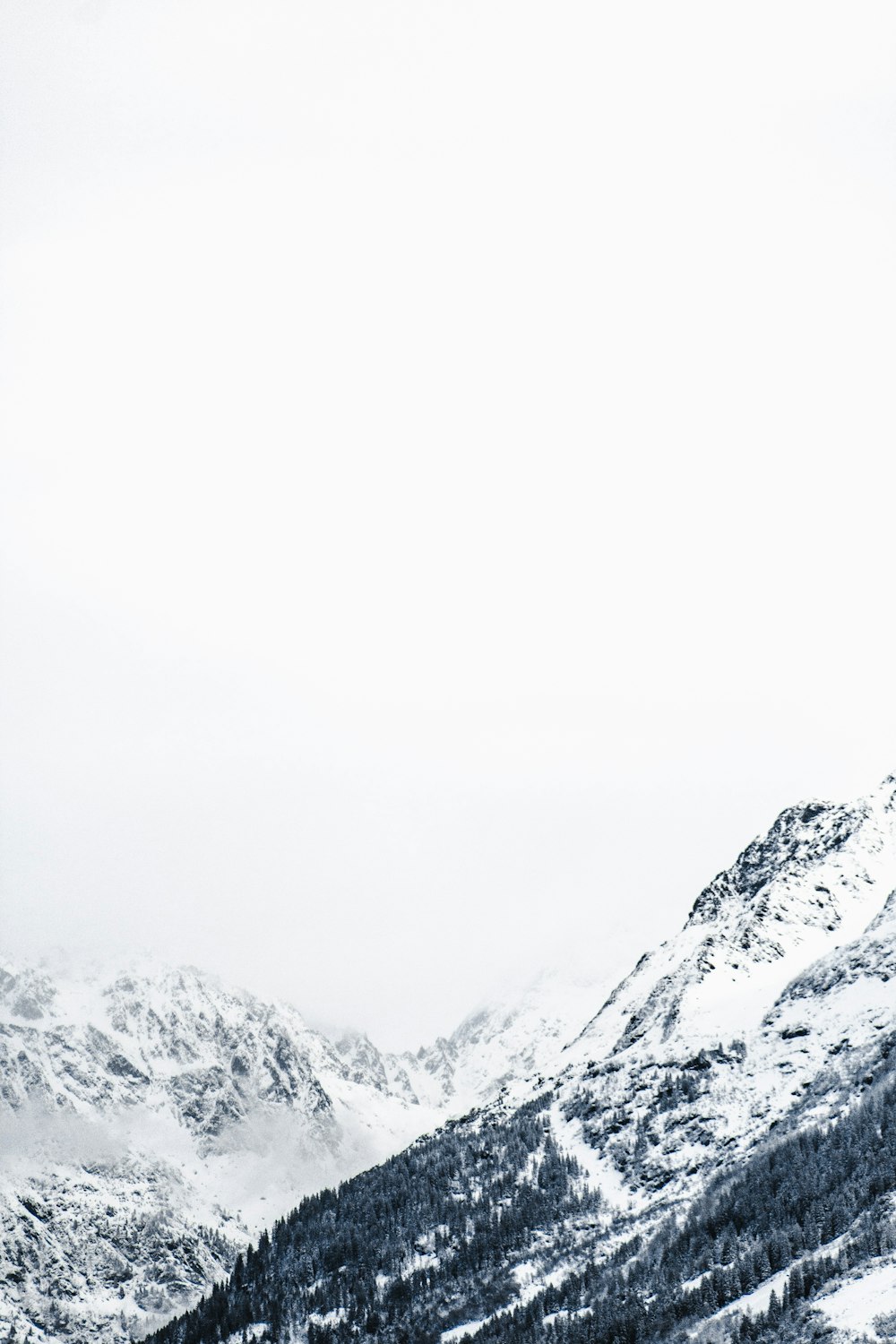 a person on a snowboard on a snowy mountain