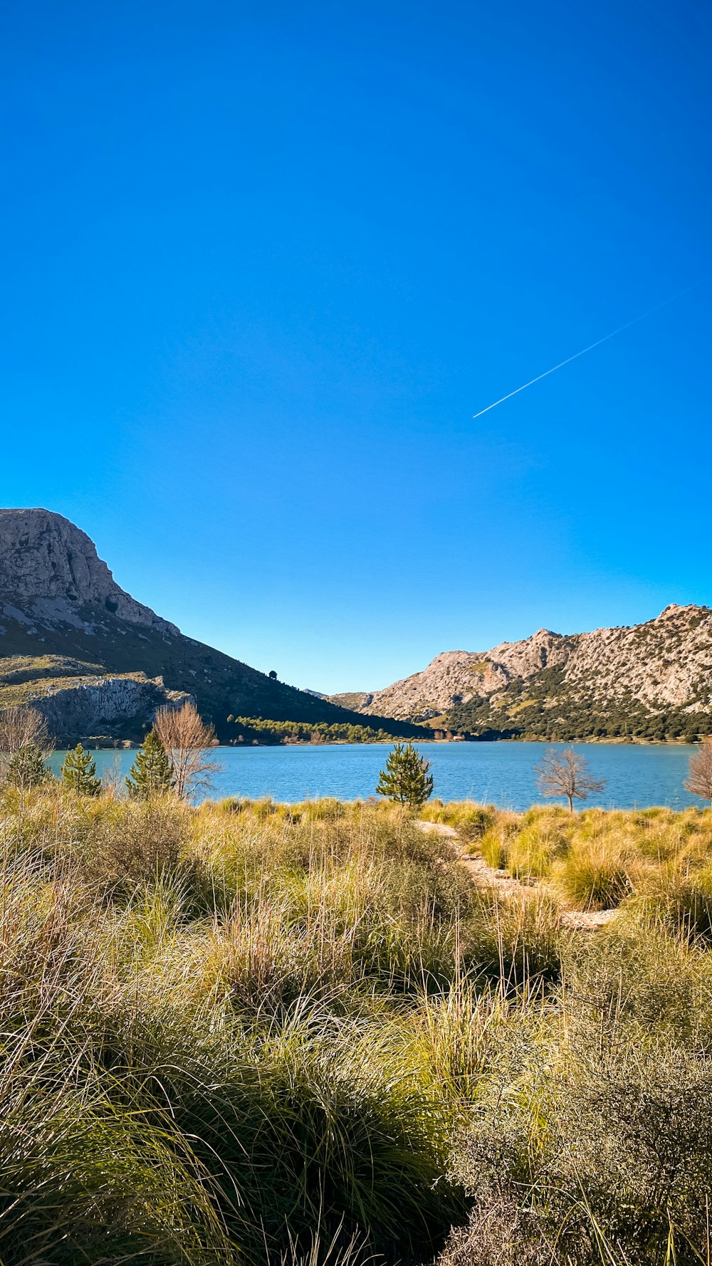 a large body of water surrounded by mountains