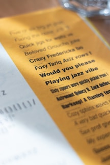 a close up of a menu on a table