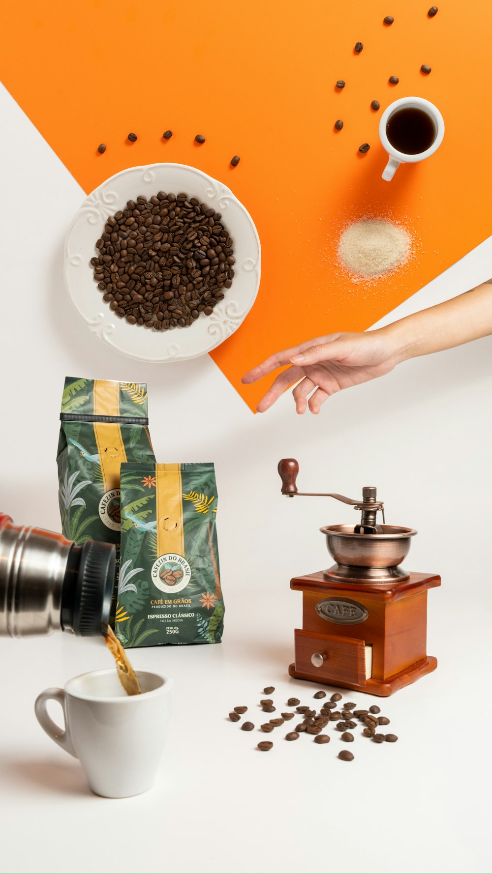 a person is pouring coffee into a cup