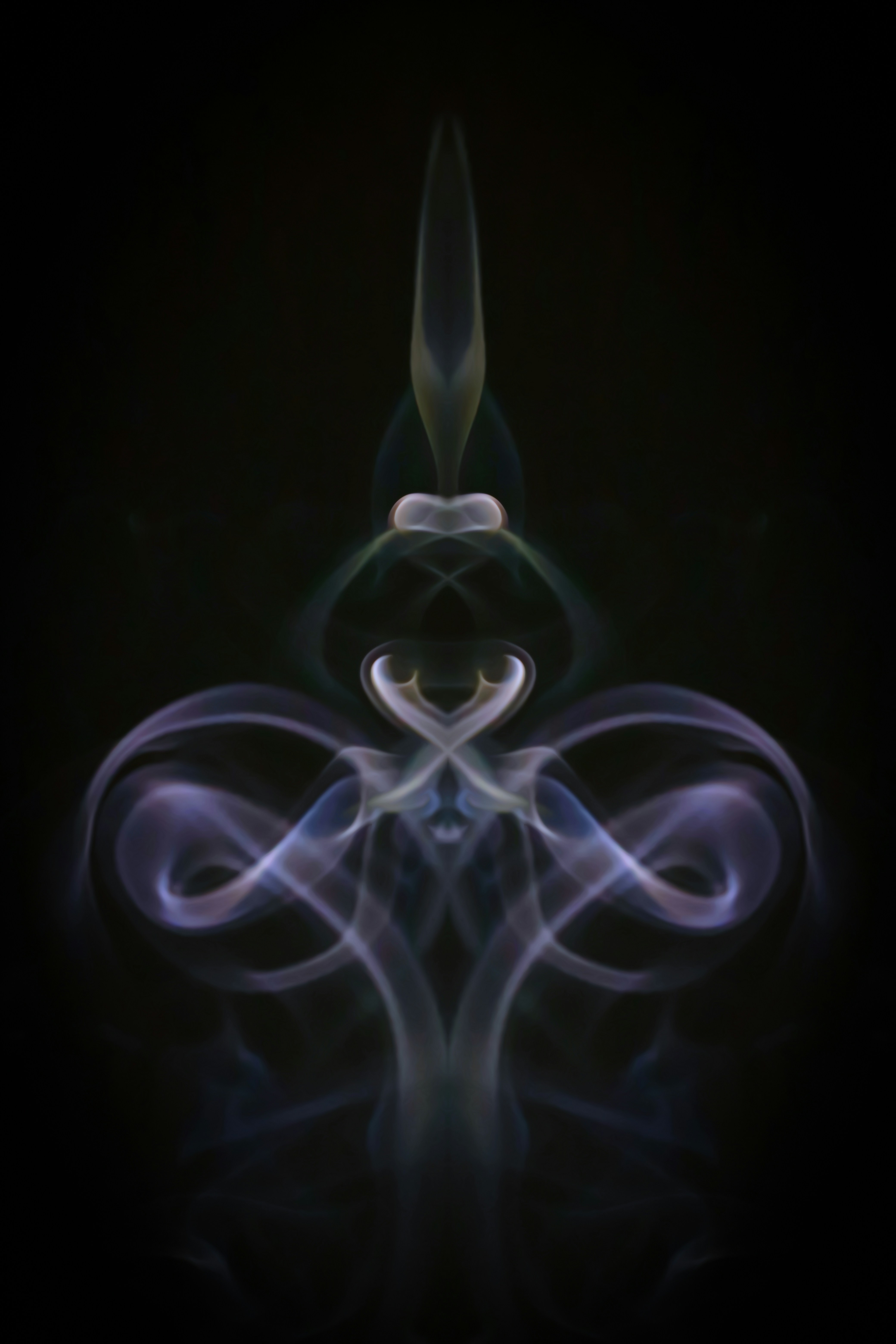 a black background with blue and white swirls