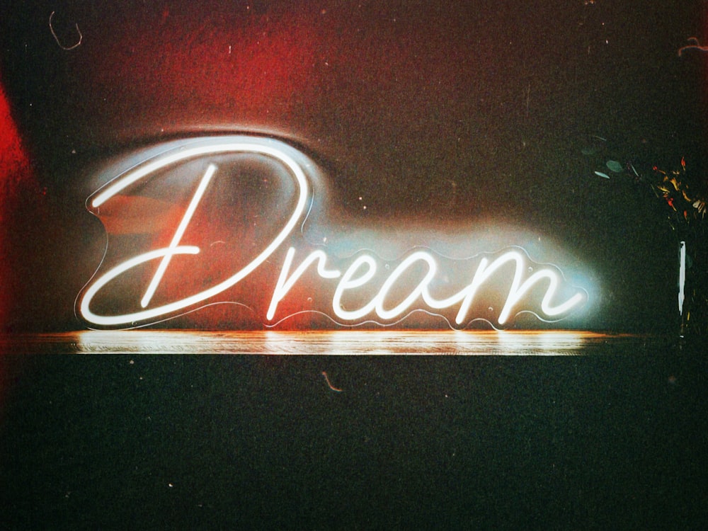 Un letrero de neón que dice Dream on It