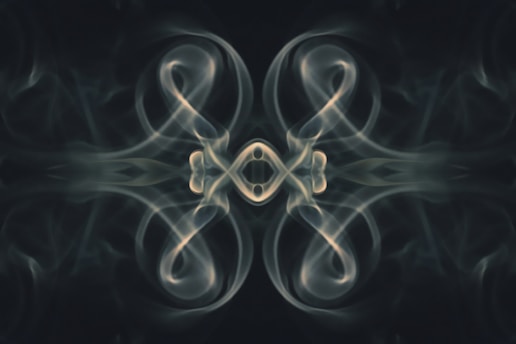 a picture of smoke with a black background