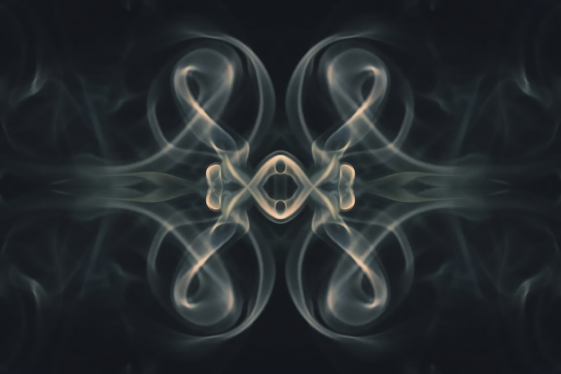 a picture of smoke with a black background