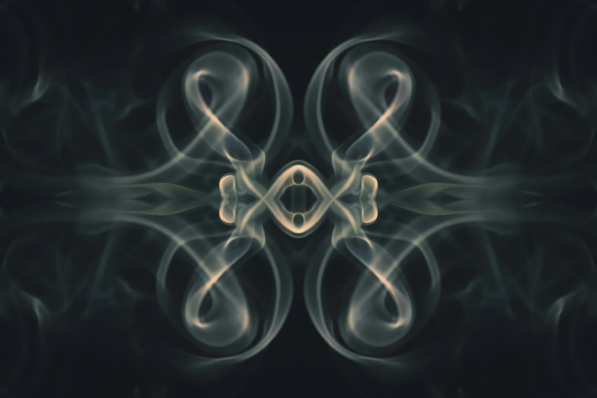 a picture of smoke with a black background