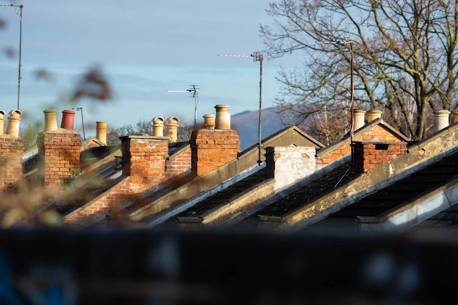 British roofline with brick chimney pots in Cheltenham