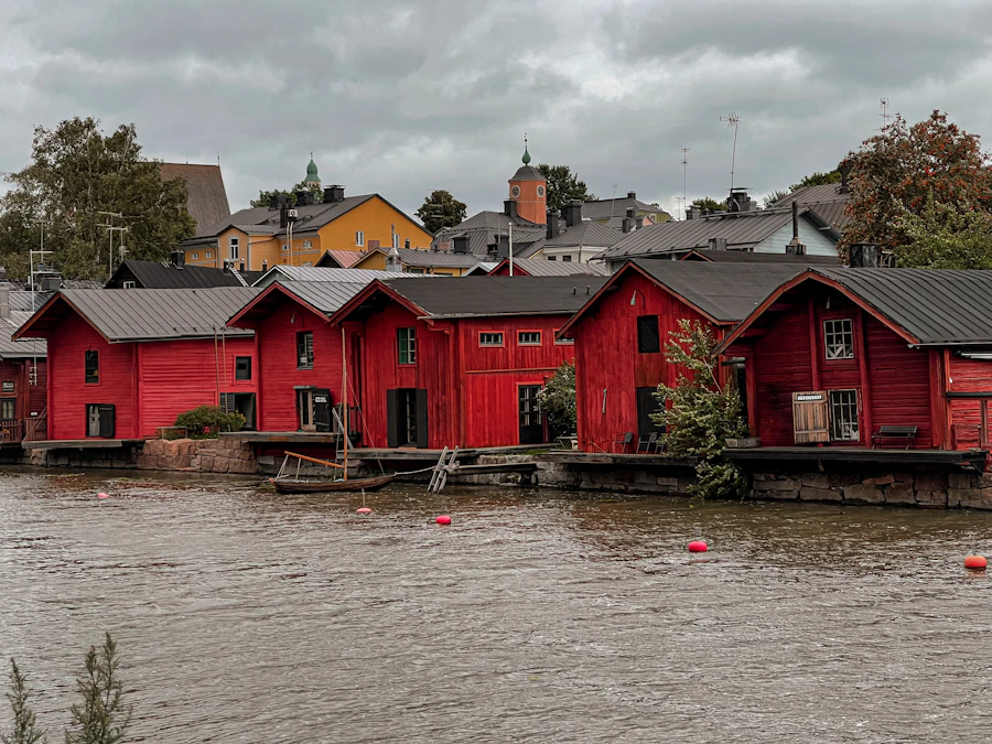 Red-ochre shore houses beside the river in Porvoo