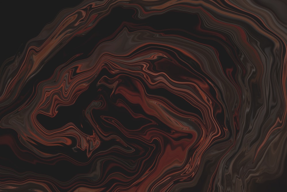 a black and red swirl with a black background