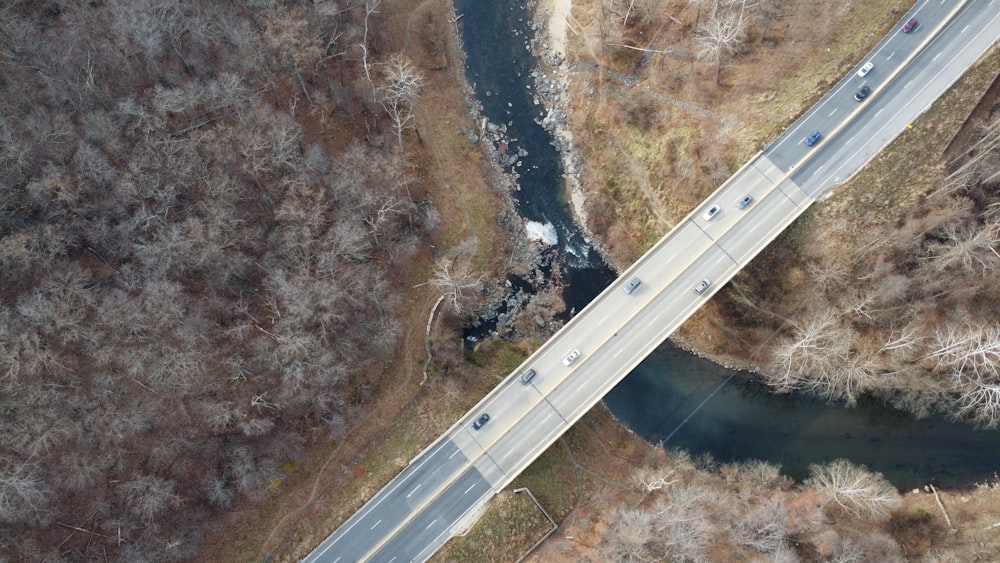 an aerial view of a bridge over a river