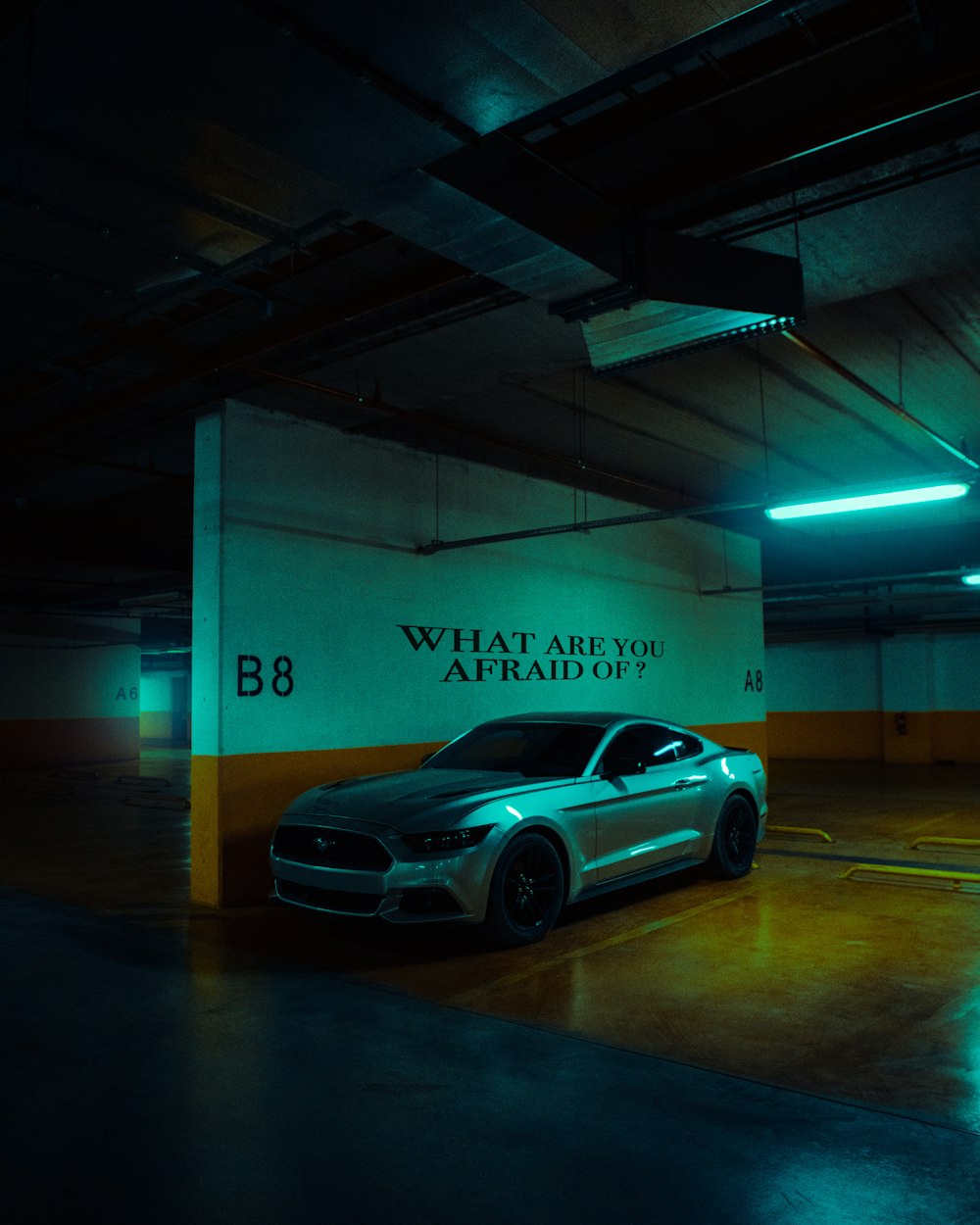 a car is parked in a parking garage