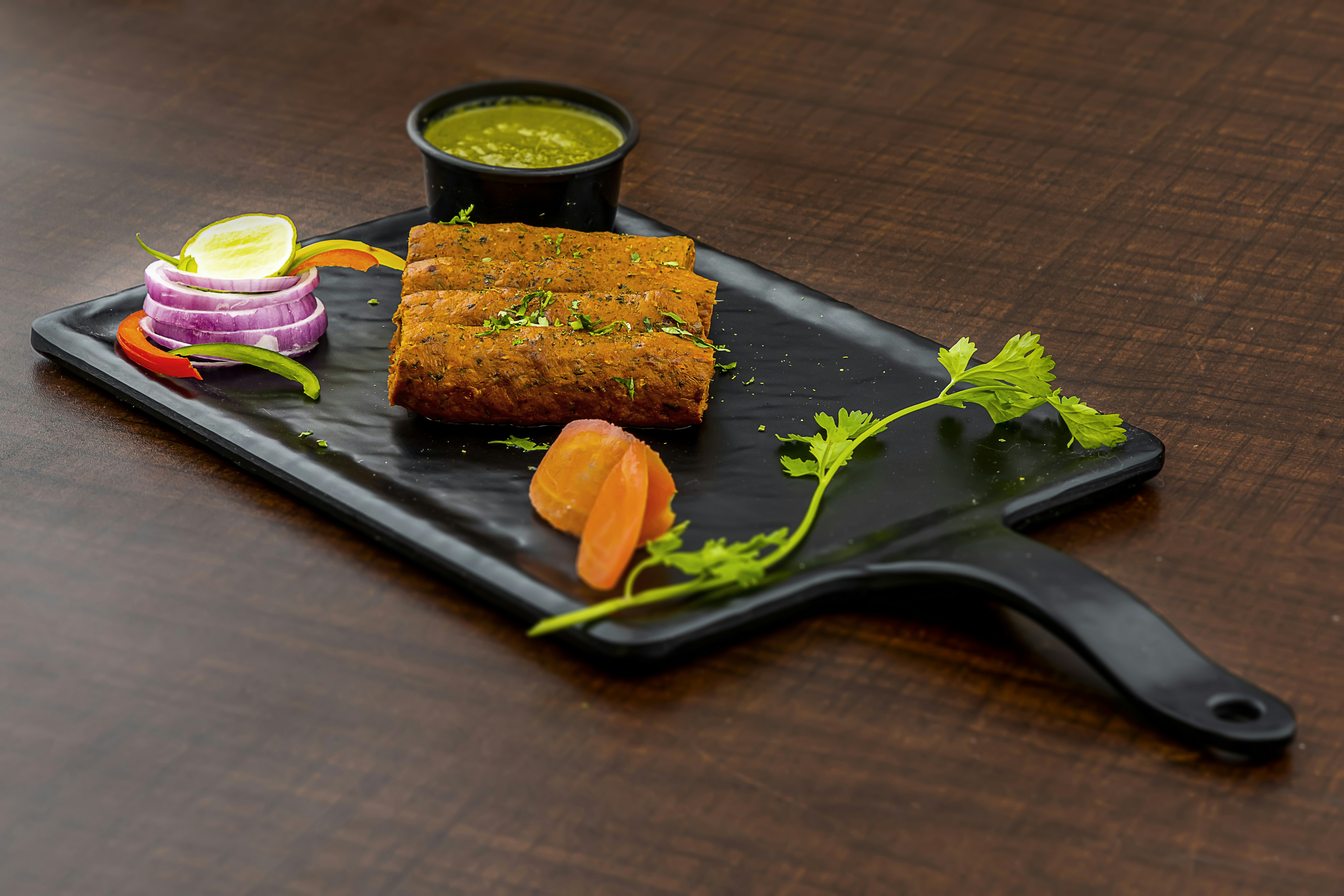 a plate of food on a wooden table