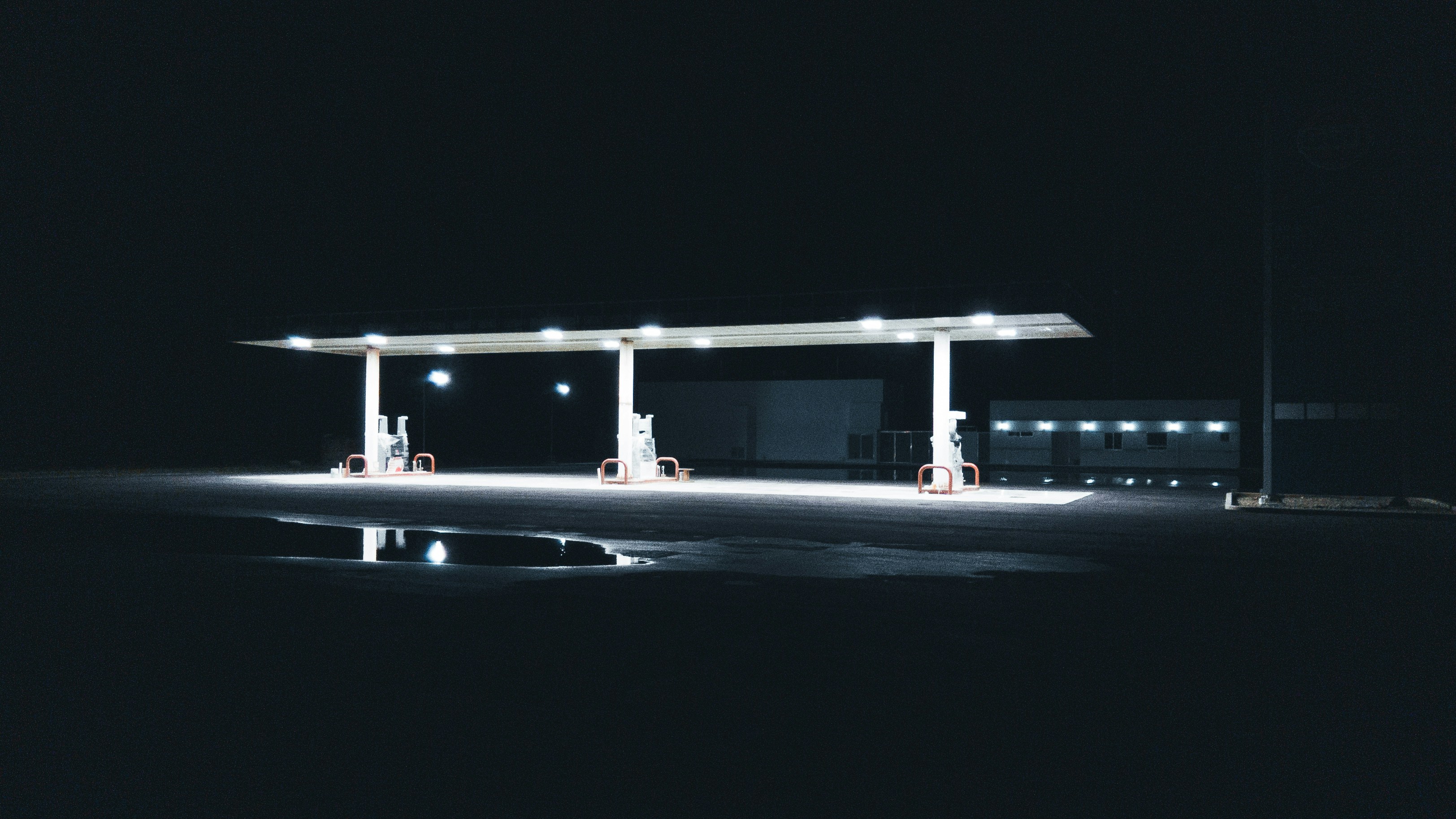 a gas station at night with no one around