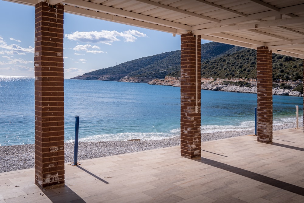 a view of a body of water from inside a building