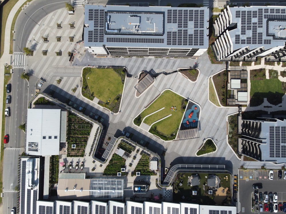 an aerial view of a parking lot and parking garages