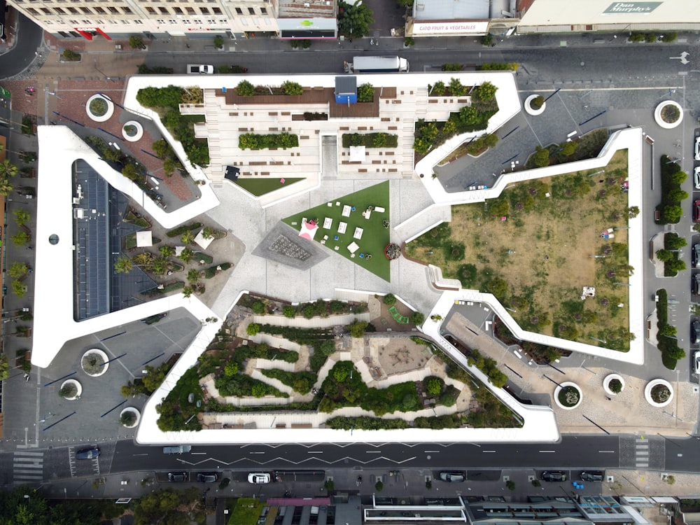 an aerial view of a building with a green roof