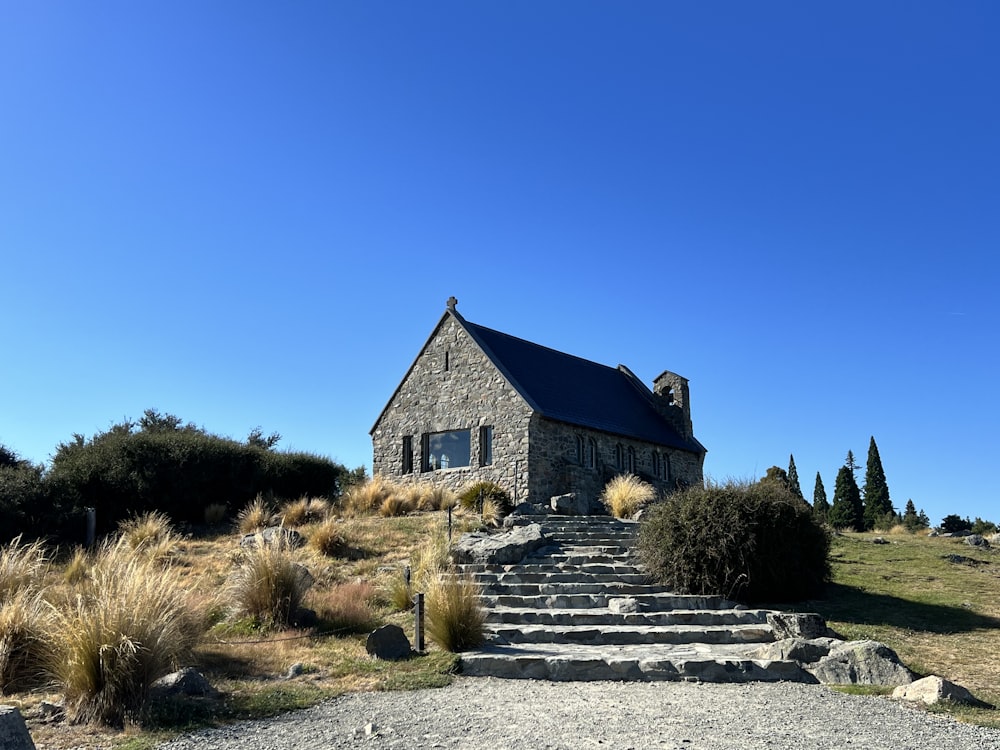 a stone building with a steep stone staircase leading up to it