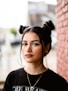 a woman with a bun in her hair