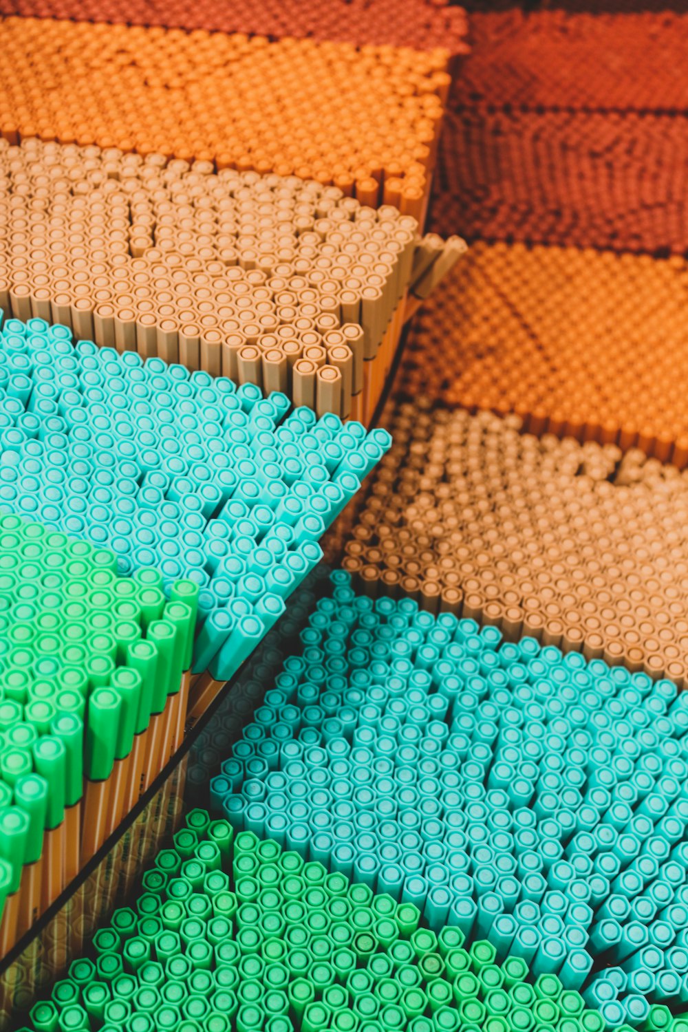 a close up of many different colored legos