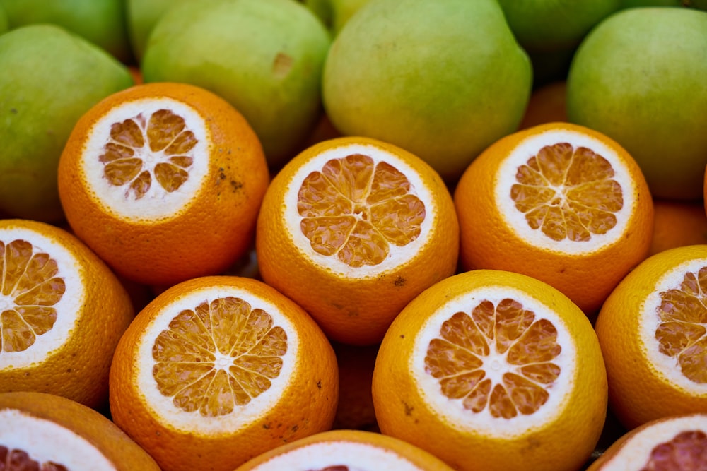 a pile of oranges sitting next to each other