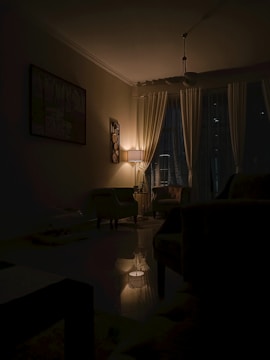 A serene living room with soft lighting and comfortable furniture.