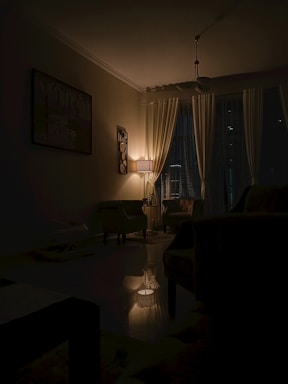 A cozy apartment living room with soft lighting and a welcoming atmosphere.