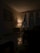 A cozy living room illuminated by stylish lamps, showcasing a warm and inviting atmosphere.