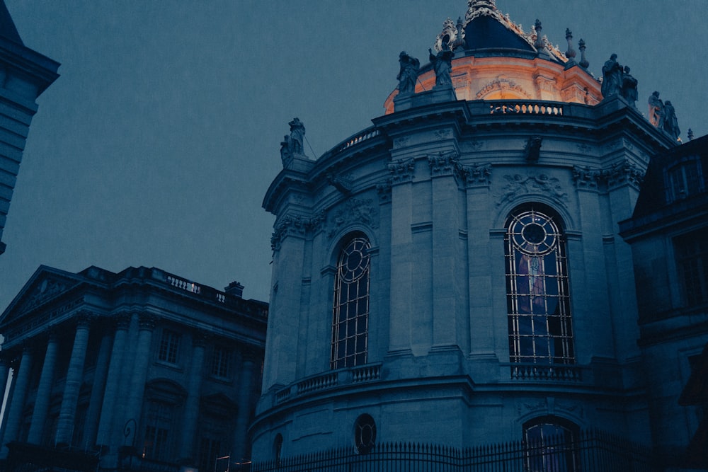 a large building with a clock on the top of it