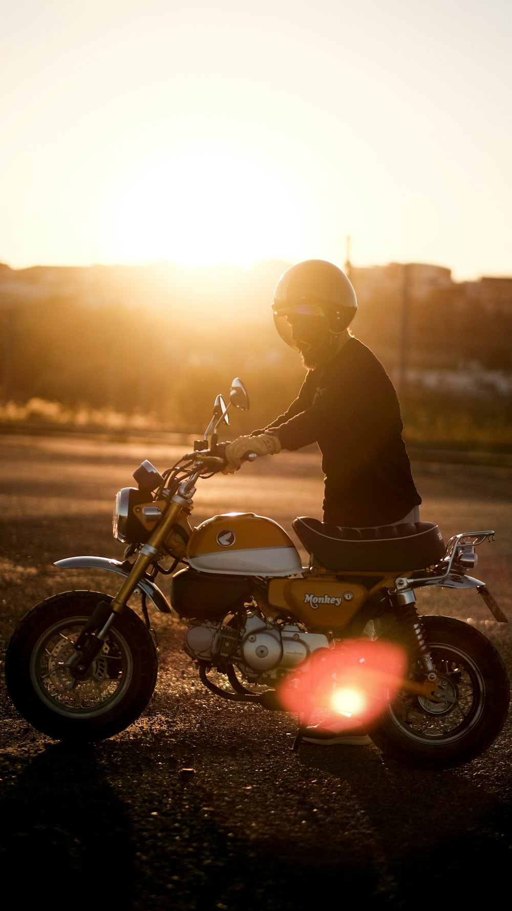 a person riding a motorcycle on a road