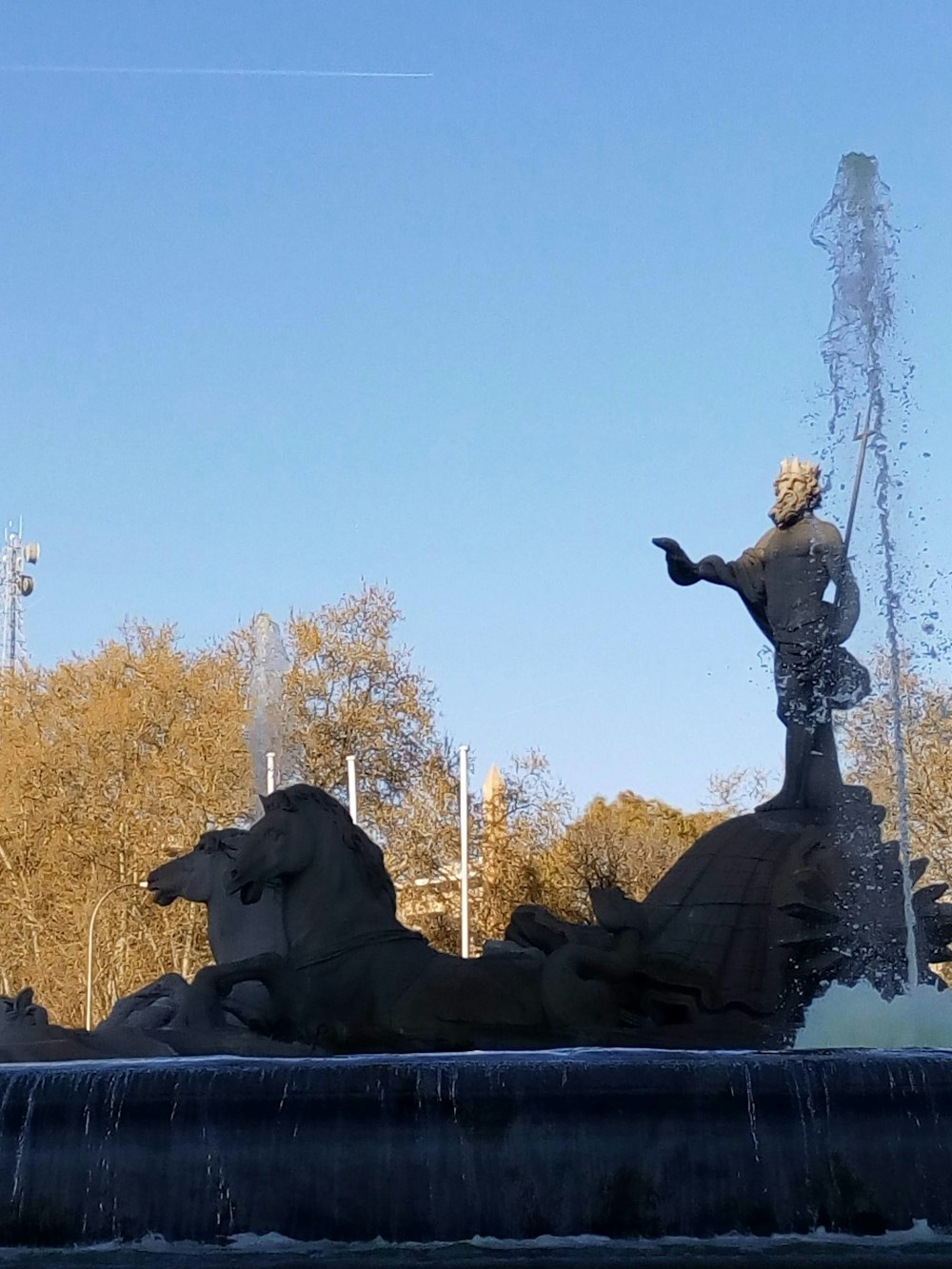 a fountain with a statue of a man riding a horse