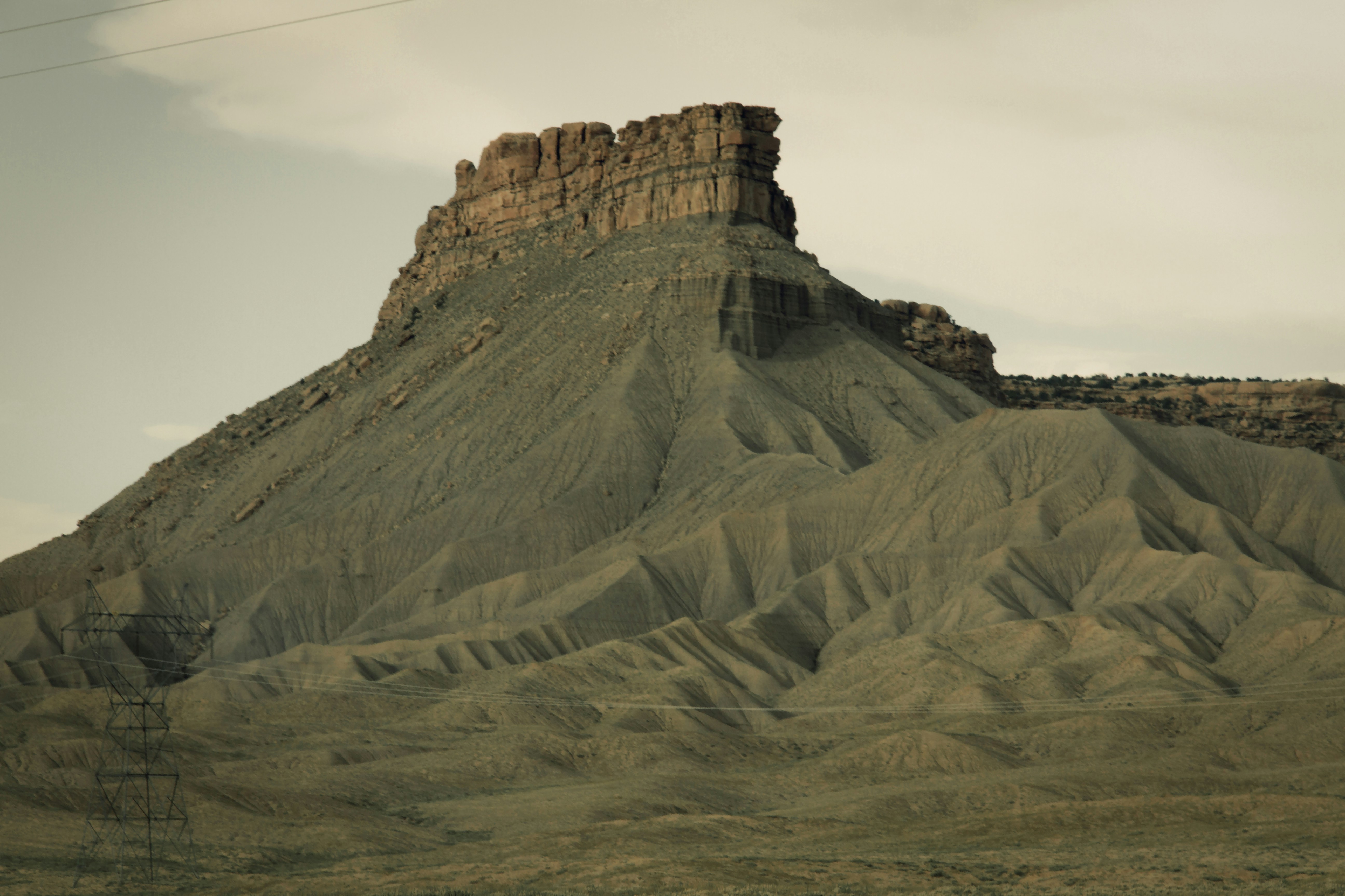 a very tall mountain with a sky background