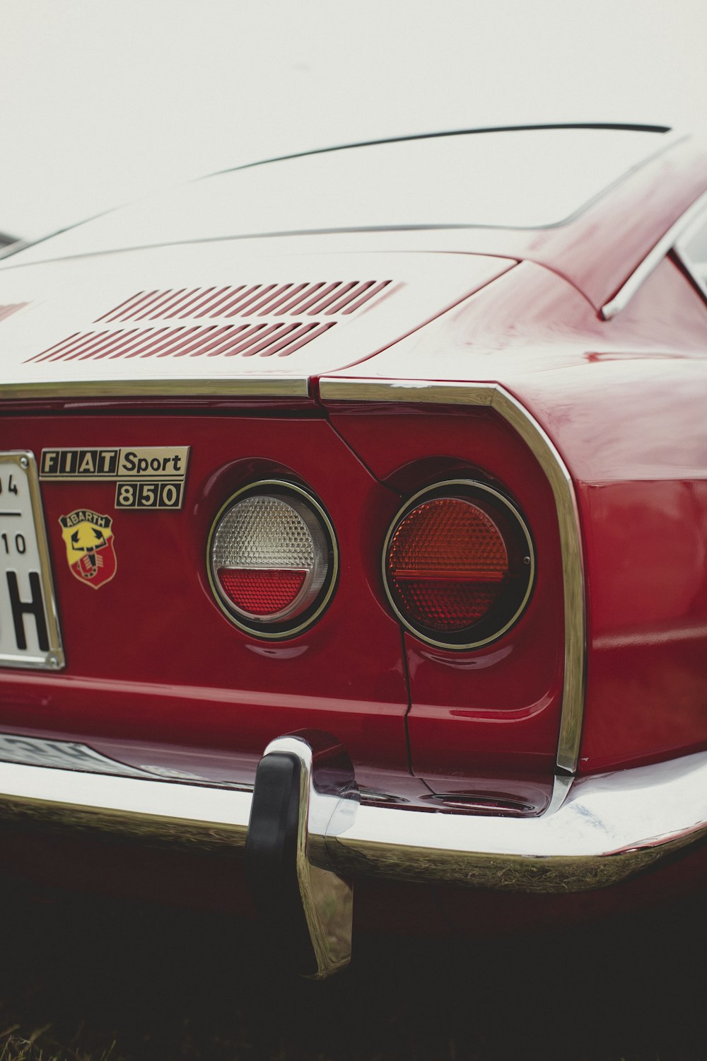 a close up of a red sports car