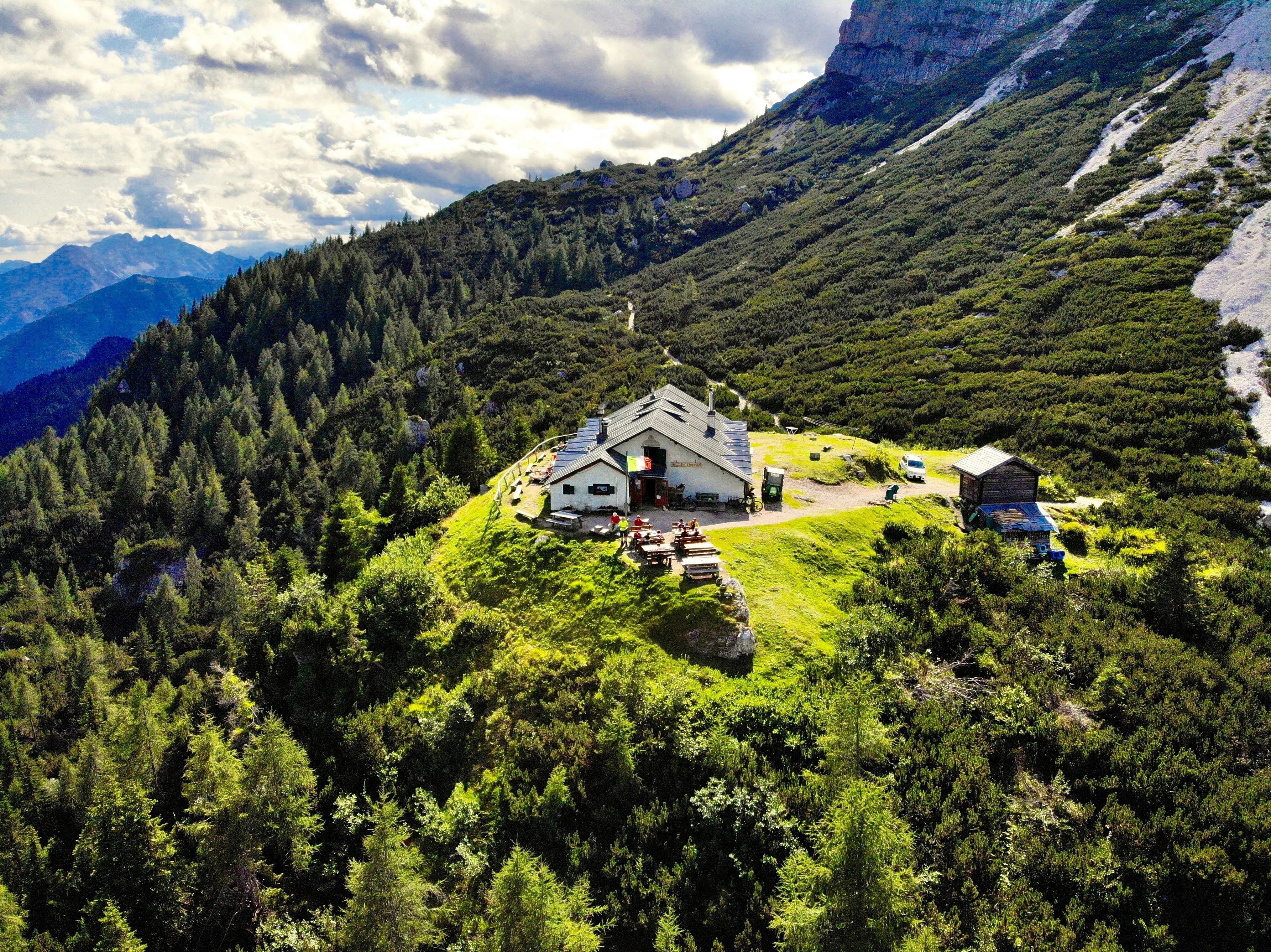 An aerial view of a house in the mountains photo – Free Outdoors Image ...