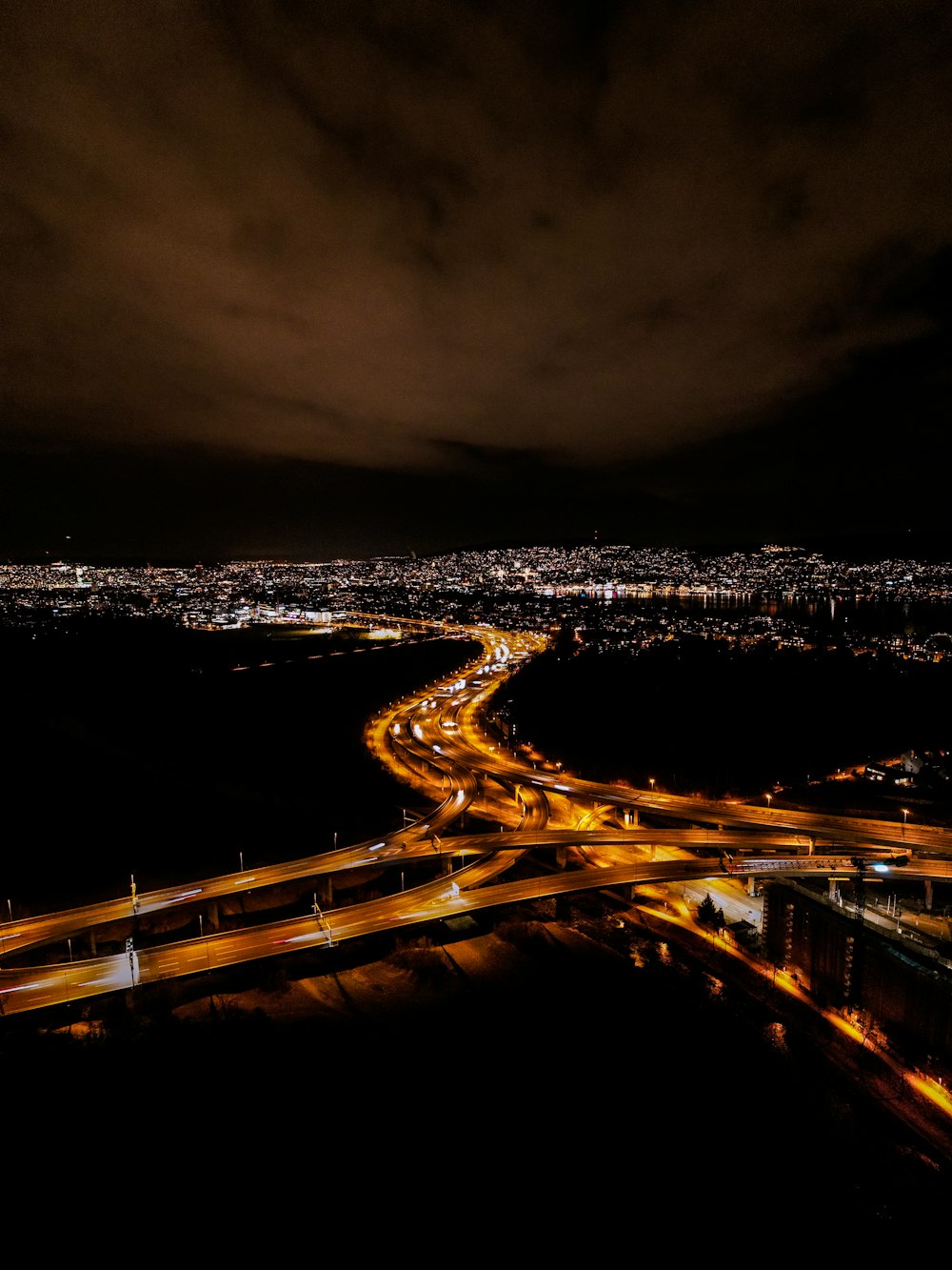 an aerial view of a city at night