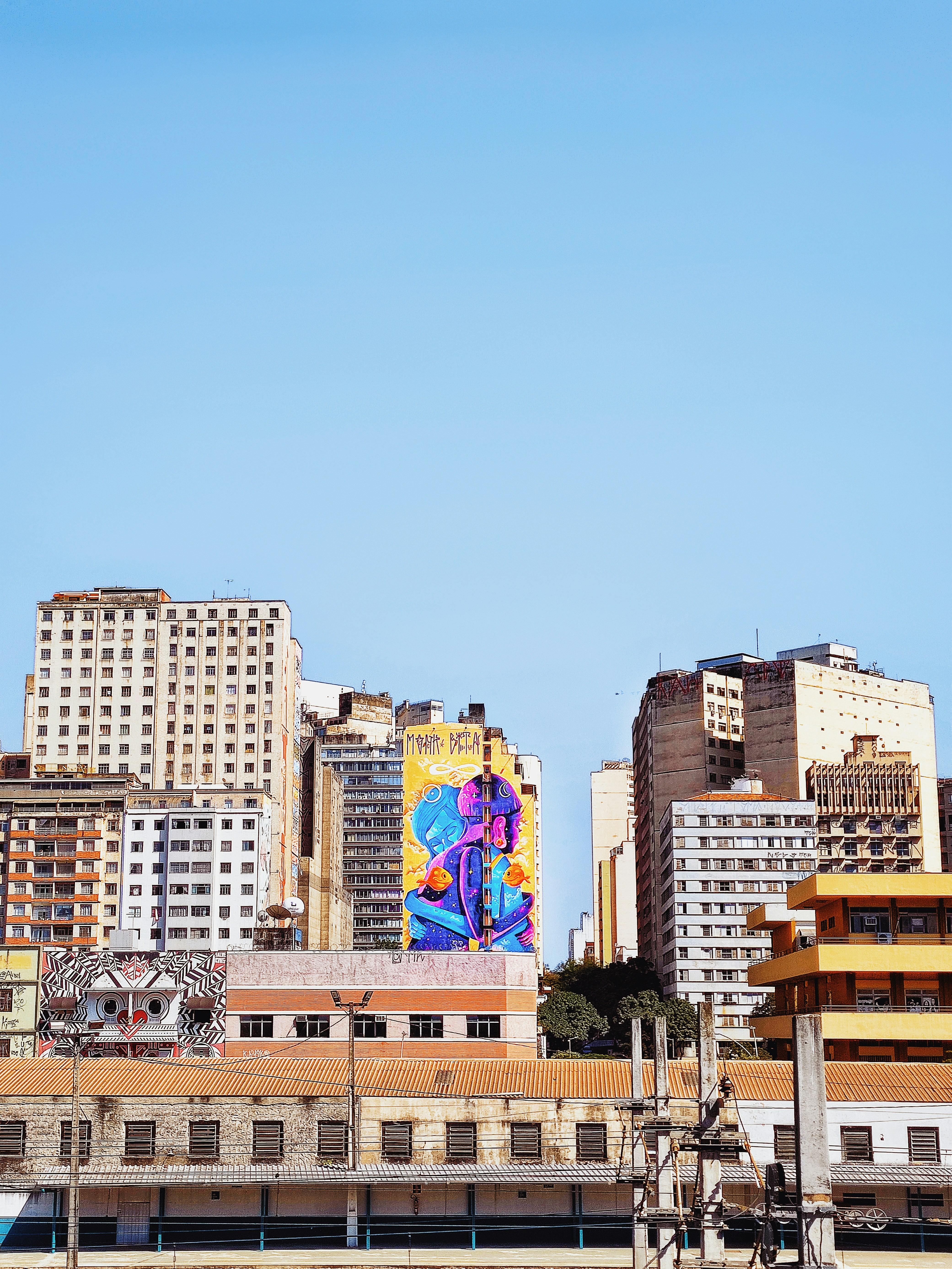 A view of a city with tall buildings photo – Free Street photography ...