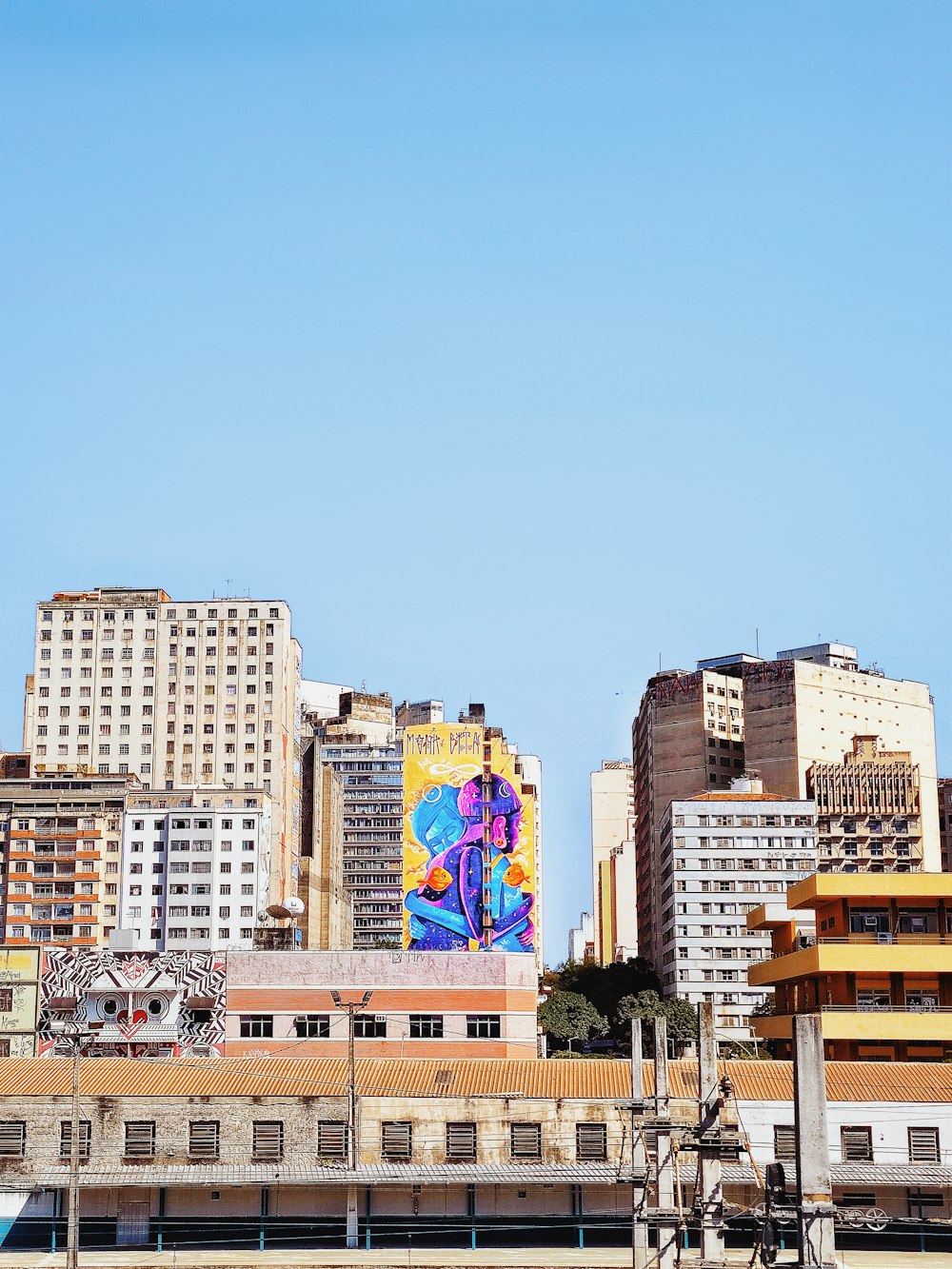 a view of a city with tall buildings