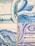 A set of ceramic tiles featuring artistic, abstract wave patterns in blue and white tones. Each tile displays a different style of swirling lines and curves, with visible cracks and a weathered look.