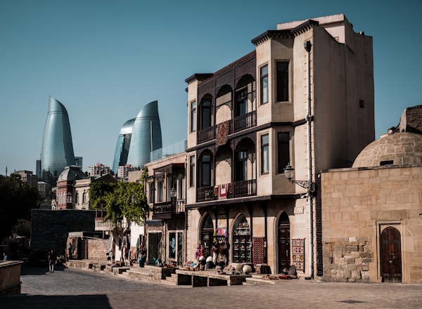 a row of buildings on a city street