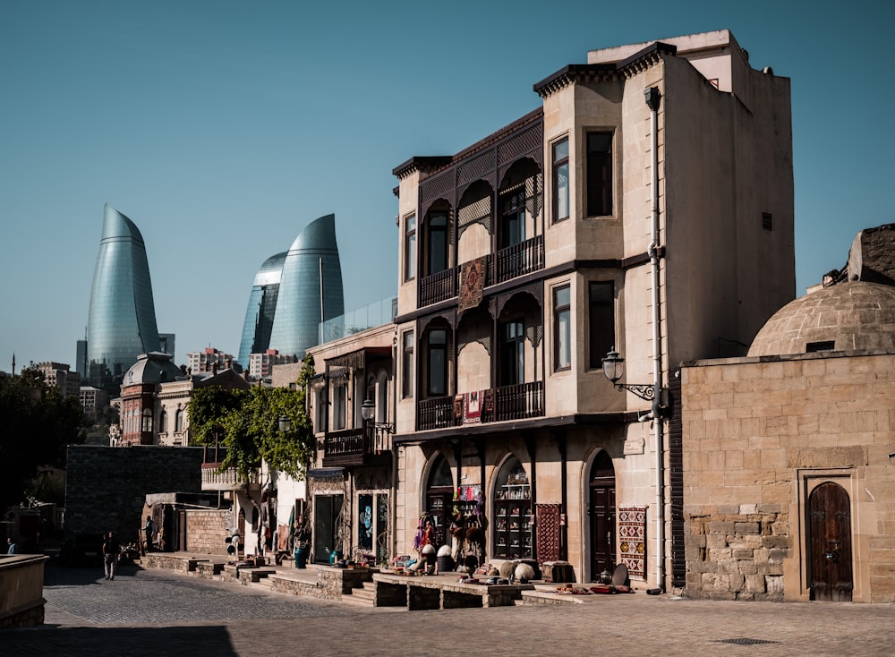 a row of buildings on a city street